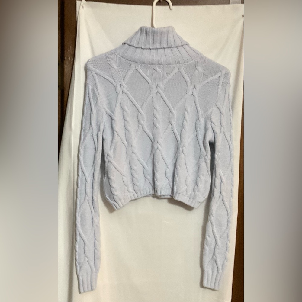 Hollister: Baby blue turtle neck extra small sweater with little Hollister tag .